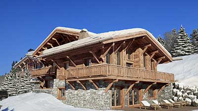 Photograph of luxurious chalet in the mountains made from computer generated images.